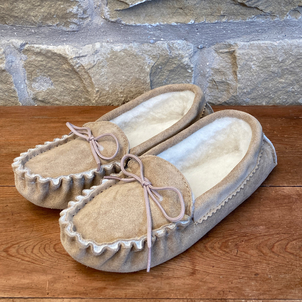 genuine sheepskin moccasin slippers with cushioned footbed and rubber sole